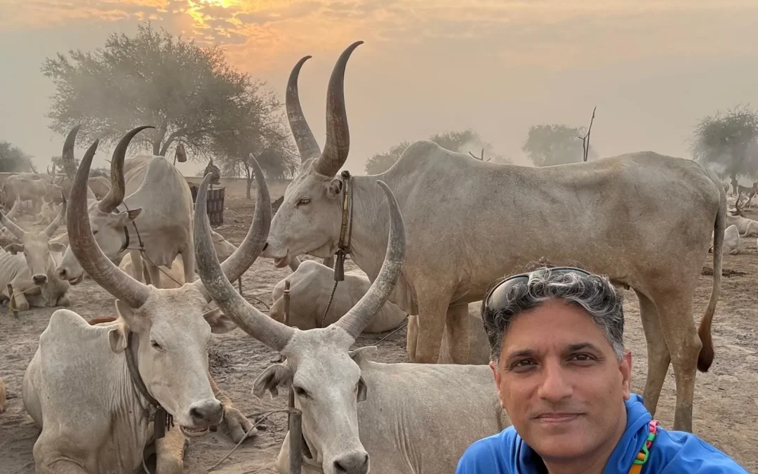 Dinka community members and cattle during a cultural tour in South Sudan