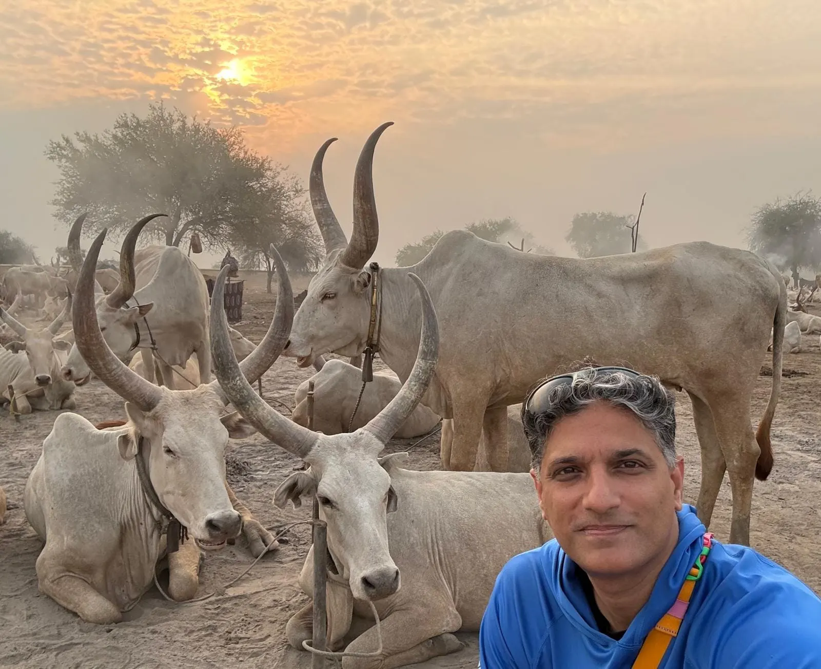 Dinka community members and cattle during a cultural tour in South Sudan