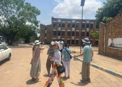 Local guide leading visitors through Konyo Konyo Market in Juba, South Sudan