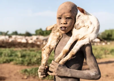 Discover the Mundari people of South Sudan, their long-horned cattle, camp life and traditions, and how to visit a Mundari cattle camp from Juba.