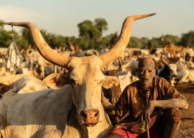 Discover the Mundari people of South Sudan, their long-horned cattle, camp life and traditions, and how to visit a Mundari cattle camp from Juba.